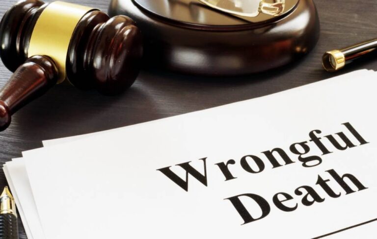 Legal paperwork for a wrongful death claim next to a judge’s gavel | Daniel Stark Injury Lawyers