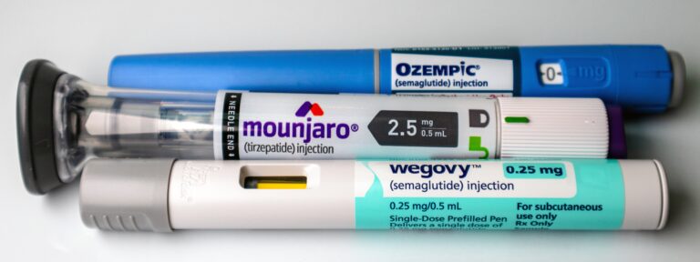 Close-up view of Ozempic, Mounjaro, and Wegovy prefilled syringes, used for GLP-1 weight loss or diabetes treatment | Daniel Stark Injury Lawyers