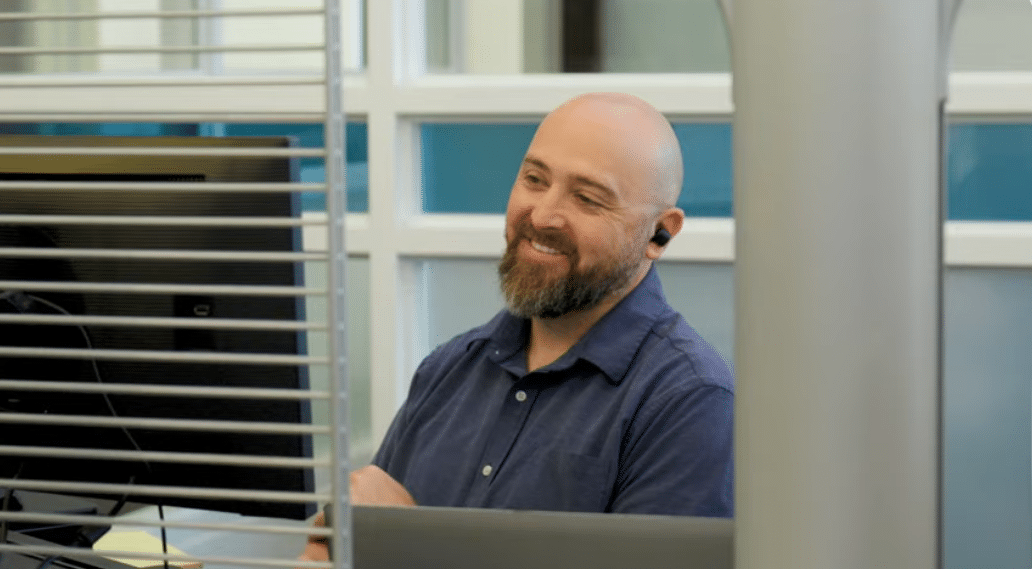 Dawson Skow conducting a virtual Zoom meeting with a client as a Life Impact Advisor | Daniel Stark Injury Lawyers