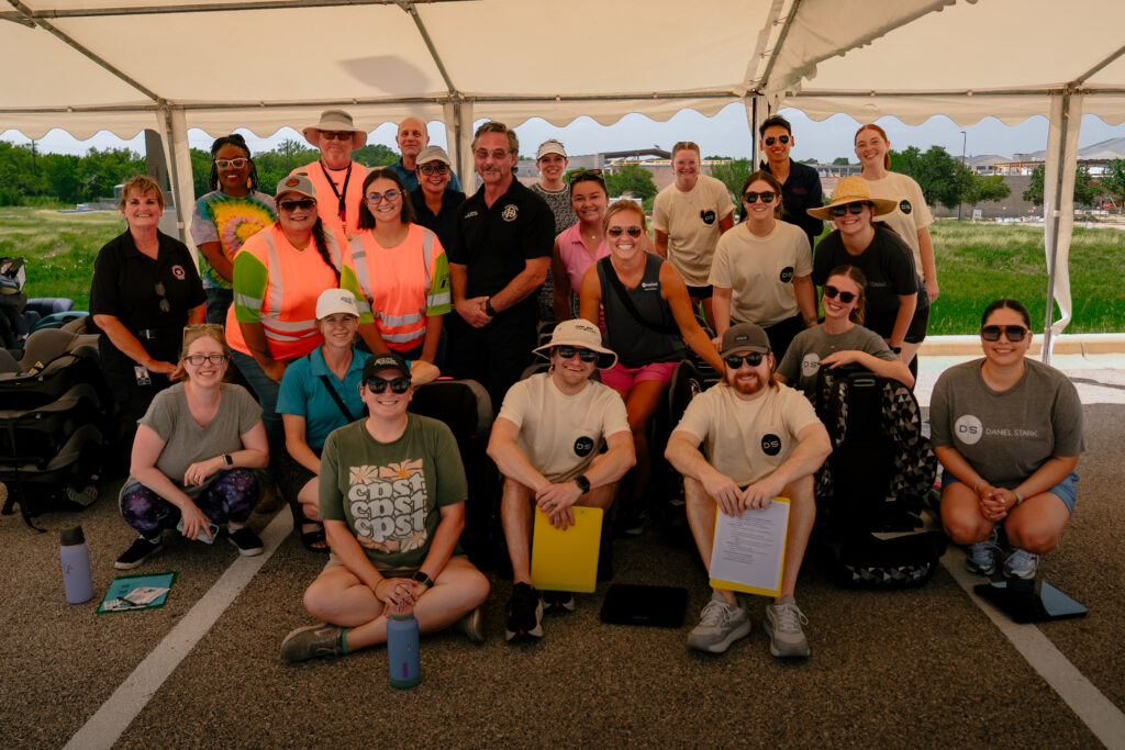 Volunteers from Daniel Stark Injury Lawyers, Texas A&M AgriLife, and partner organizations at the Georgetown car seat safety event | Daniel Stark Injury Lawyers