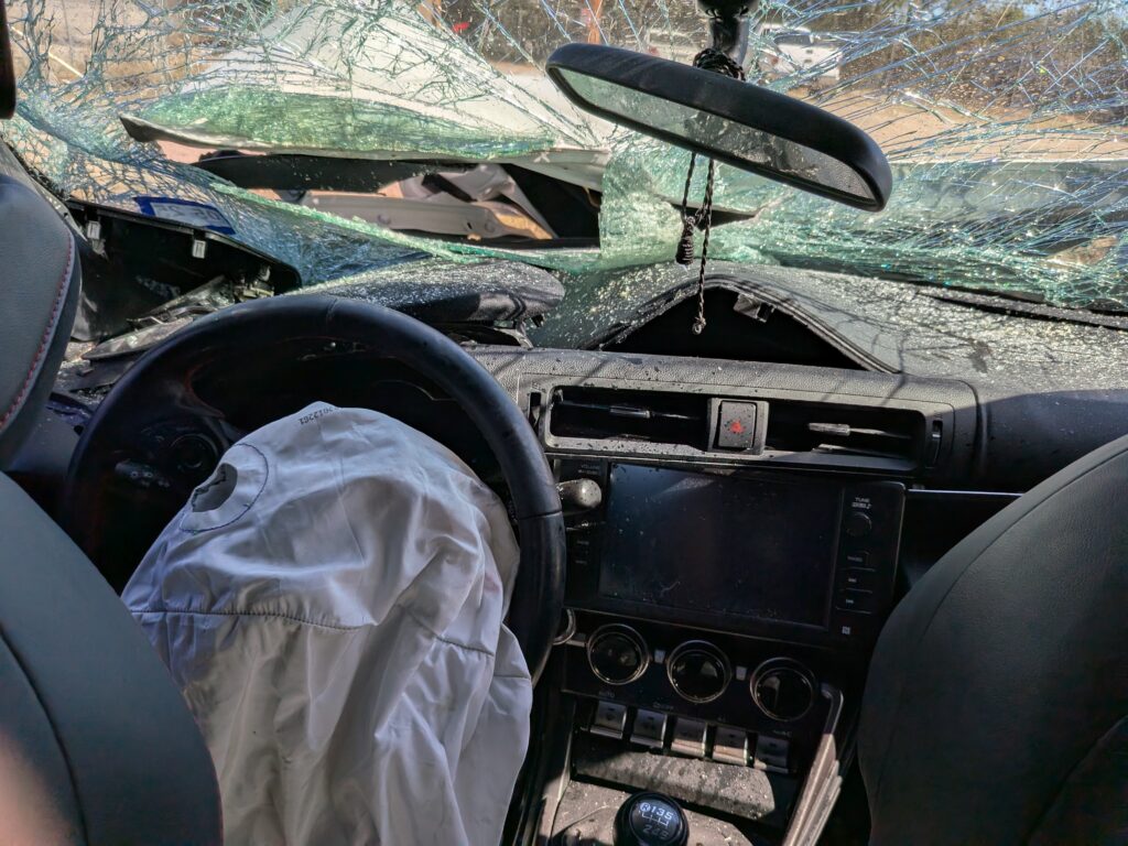 Busted windshield of client after truck accident in Bertram, Texas | Daniel Stark Injury Lawyers